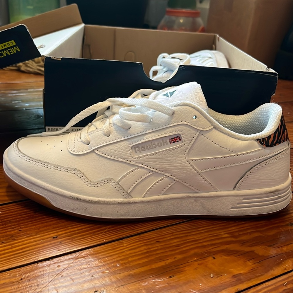 Reebok sneakers worn once. Very narrow fit, they feel more like a size 8